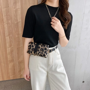 Chic leopard print waist bag with black leather belt and decorative gold ring buckle