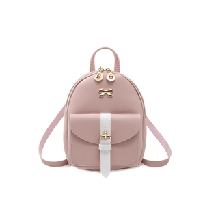 Mini zaino moda rosa e bianco con fiocco dorato e dettagli della cerniera a foglia