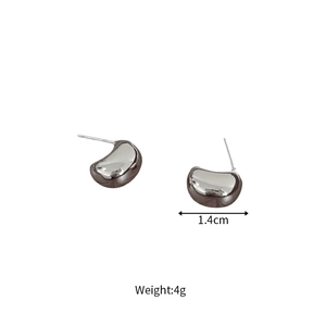 Detailed view of silver bean-shaped stud earrings showing 1.4cm width measurement