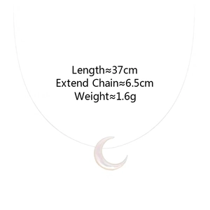 Detailed view of crescent shell pendant on invisible chain with size specifications