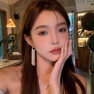 Sparkling long tassel waterfall earrings with silver rhinestones for elegant women