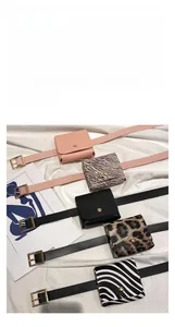 Close-up of animal print waist bags showing storage for lipstick and keys on a belt