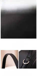 Detailed macro view of litchi grain leather texture and reinforced stitching on handles