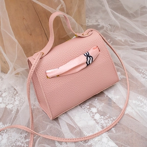 Pink lychee grain leather handbag with floral silk scarf and shoulder strap for women
