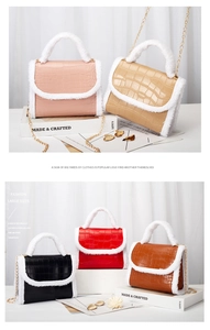 Detail of crocodile pattern small square bags with plush trim in various colors
