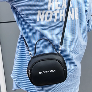 Black double-zipper letter print crossbody bag with handles and thin shoulder strap