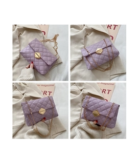 Detailed views of purple quilted crossbody bag with gold chain and geometric lock buckle