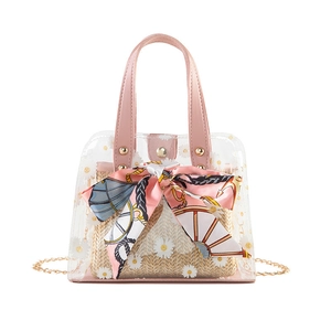 Daisy print clear PVC bag with straw inner pouch and pink scarf on metal chain strap