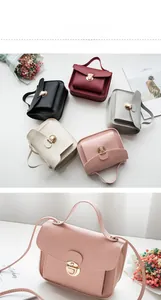 Detailed view of elegant mini square handbags with golden circular buckles in five colors