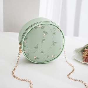 Petit sac rond vert clair avec broderie florale et bandoulière en chaîne pour femmes