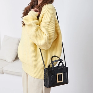 Fashionable black crocodile pattern shoulder bag with a bold gold square buckle for women