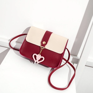 Burgundy and cream flap square bag with gold buckle and pink double heart charms