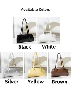 Detail der minimalistischen Baguette-Taschen in Schwarz, Weiß, Silber, Gelb und Braun