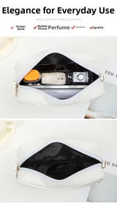 Detail shot showing internal capacity for phone, power bank and cosmetics in white bag