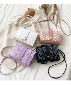 Daisy lace patterns on stylish PU shoulder bags in white, pink, purple, and black colors