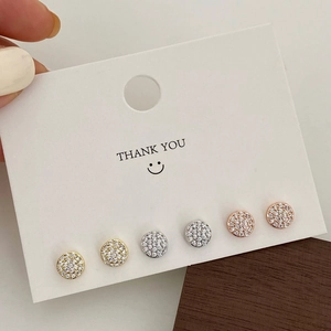 Three pairs of sparkling micro-pave cubic zirconia stud earrings in gold silver and rose gold