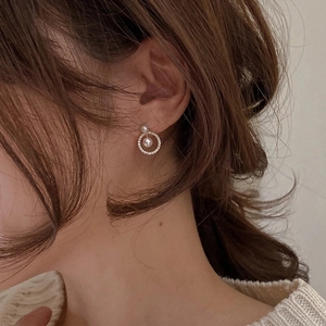 French vintage geometric zircon pearl earrings shown on a model with elegant profile view