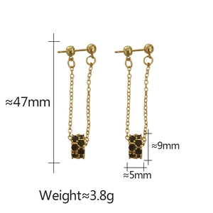 Detail view of gold tassel earrings with micro-set black zircons and dimensions