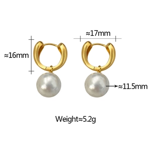 Detailed view of geometric pearl earrings showing 16mm gold hoop and 11.5mm pearl size