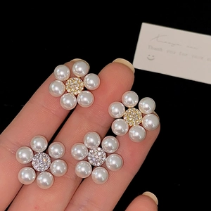 Elegant French flower pearl stud earrings with zircon centers in gold and silver finish