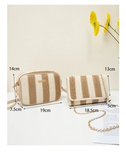 Detailed view of woven straw shoulder bag and chain clutch with striped summer texture