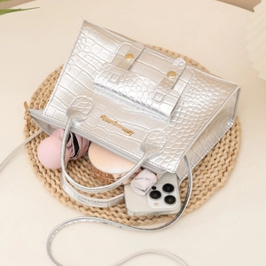Silver crocodile texture handbag with letter logo, top handle and crossbody strap style