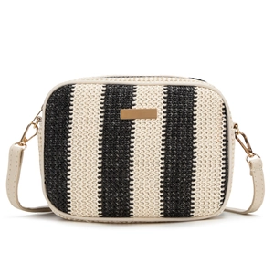 Fashionable black and white striped woven straw crossbody bag with gold metal plate and cream strap