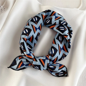 Geometric color block satin silk square scarf with light blue base and orange accents