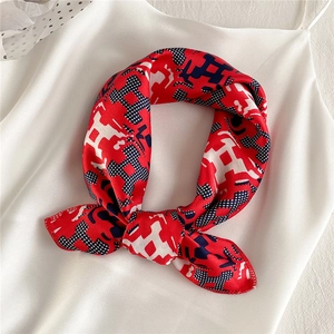 Elegant red satin square scarf with geometric H-pattern print on white silk background