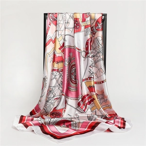 90cm nautical silk scarf with sailboats and anchors pattern hanging on a black rack