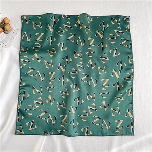 Green silk-like square scarf with leopard print Z pattern and stitched edges