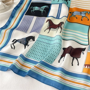 70cm silk scarf with geometric horse print in blue, orange, and beige satin finish