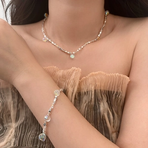 Minimalist silver choker and bracelet set with iridescent teardrop crystal pendants