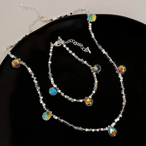 Silver bead necklace and bracelet set with colorful teardrop crystal pendants