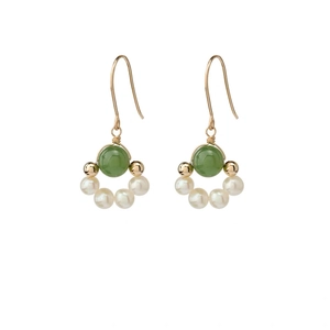 Elegant gold drop earrings with a round green jade stone and five white hanging pearls