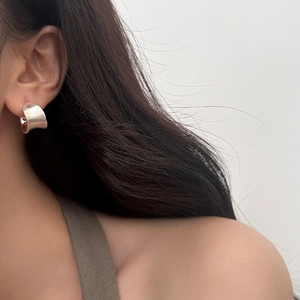 Minimalist silver C-shape chunky hoop earrings with a matte brushed metallic finish