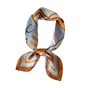Fashionable 70cm square silk scarf featuring geometric horse patterns in orange and blue