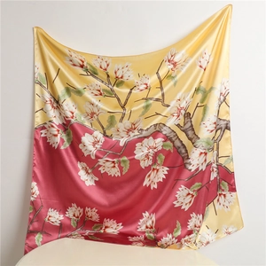 Satin silk scarf featuring yellow and magenta gradient with magnolia floral print