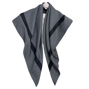 Elegant navy and white silk scarf with geometric pattern and white camellia flower