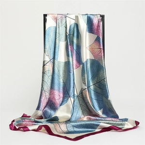 Elegant silk-like scarf with artistic leaf patterns in blue and purple, 90cm square wrap