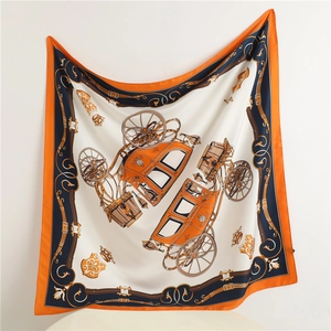 Detailed close-up of luxury silk scarf featuring vintage carriage pattern and orange border