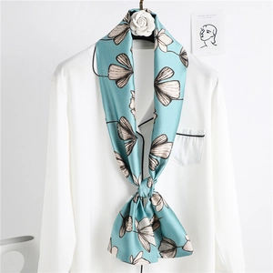 Floral print satin skinny scarf for women styled on a white professional shirt collar