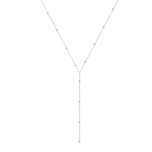 Collier en Y argenté minimaliste avec perles polies sur une chaîne délicate