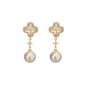 French design clover earrings with zircons and white pearl pendants on white background