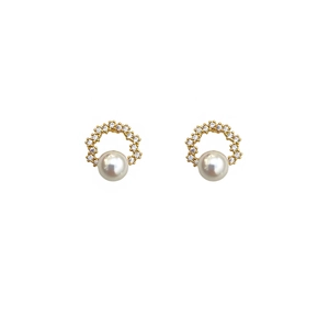 Elegant gold earrings with round white pearls and zircon accents on a white background