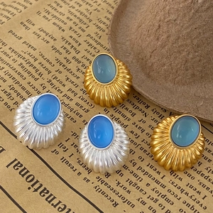 Boucles d'oreilles vintage en opale, base en métal doré et argenté avec pierres bleues