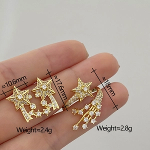 Detailed view of gold star earrings with cubic zirconia and weight measurements