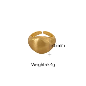 Macro detail of 15mm wide golden brushed matte ring with smooth adjustable band