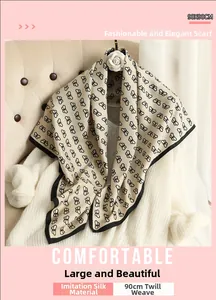 Detail view of 90cm square silk scarf with black butterfly print on beige twill fabric