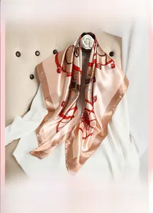 Close-up of 90x90cm satin silk scarf with vintage carriage pattern and glossy finish